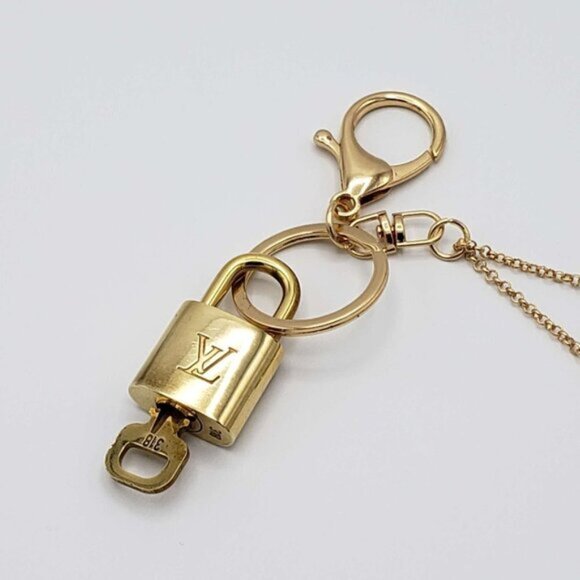 Authentic Louis Vuitton Lock & Key with Unbranded Flower Charm, Keychain
